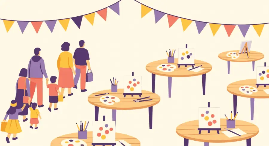 Decorated community rock painting event space with bunting flags and outdoor tables
