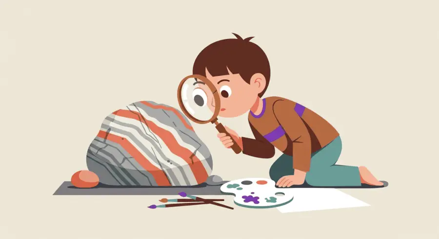 Child using magnifying glass to examine geological texture of a natural stone