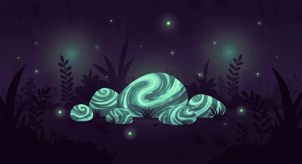 Painted rocks glowing with ethereal green and blue light in a dark garden