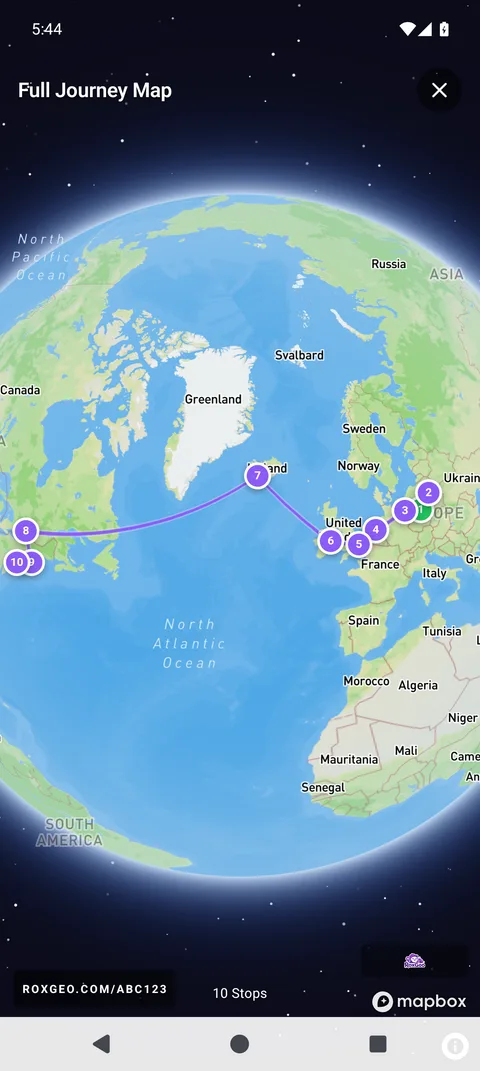 RoxGeo app screen showing a painted rock's full journey traced across continents with stops on the globe